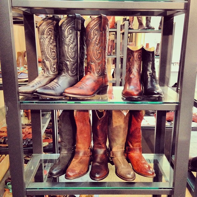 Frye cowboy boots on display