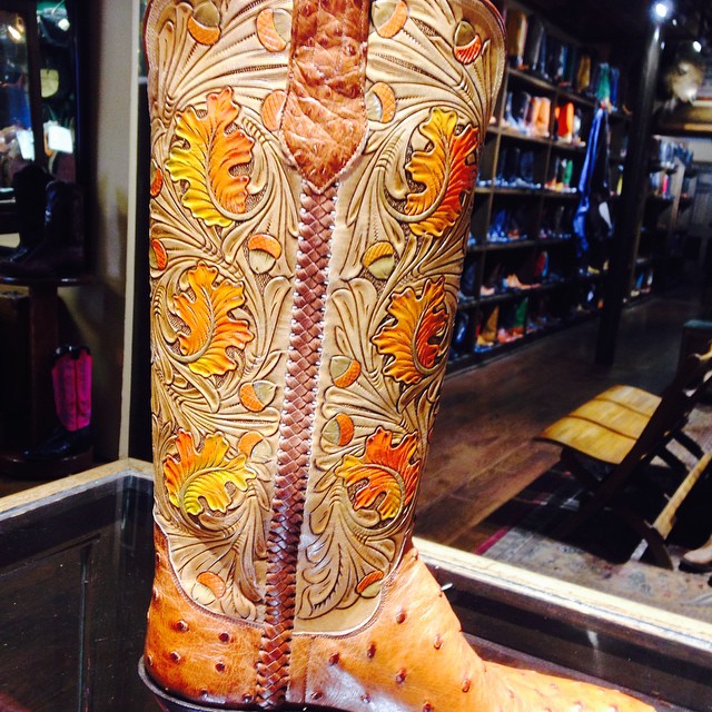 carved and painted cowboy boots