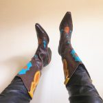 Showing off lovely cowboy boots on social media :)